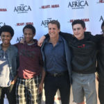 Producer/Director Kenneth A. Carlson with some of the students from Loyola High School